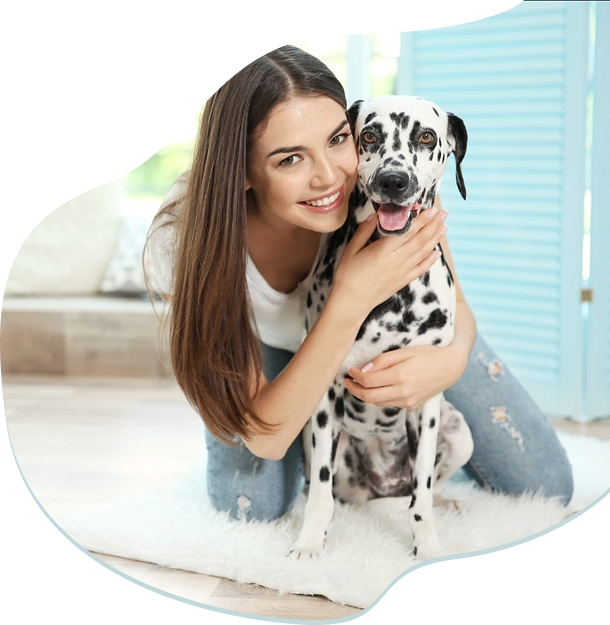 A woman with her dalmatian dog